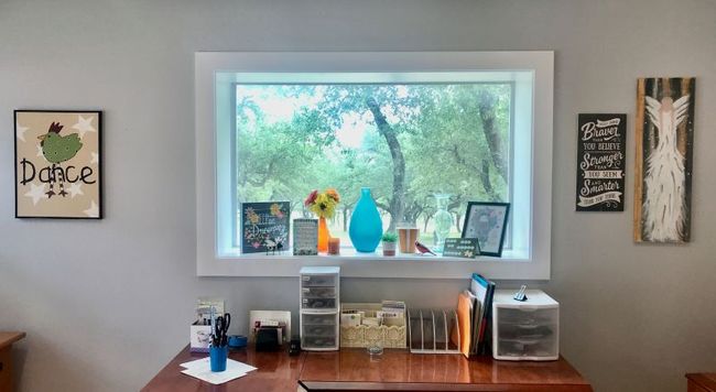 Detailed view of an office area with picture window | Image 36