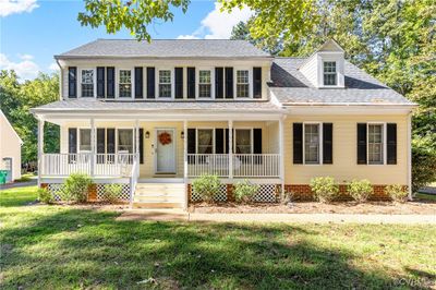 View of front of home with a porch | Image 1