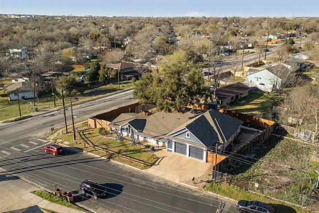 The corner lot location gives this home a unique, open feel, with plenty of space both inside and out to relax or entertain | Image 33