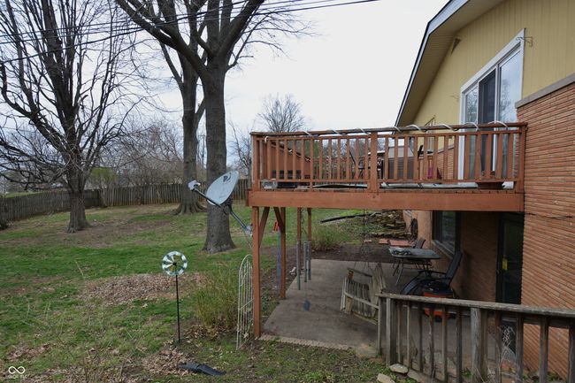 view of yard featuring fence and a deck | Image 17