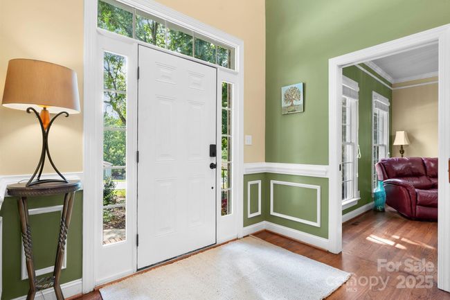 Back downstairs and to left of entry is Bedroom 5 | Image 29