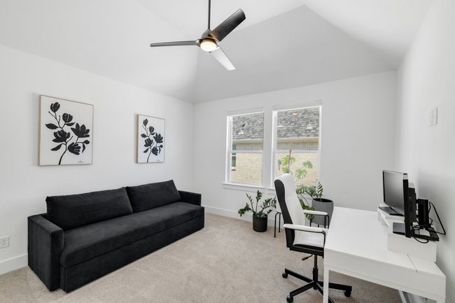 Office with lofted ceiling, carpet, a ceiling fan, and baseboards | Image 32