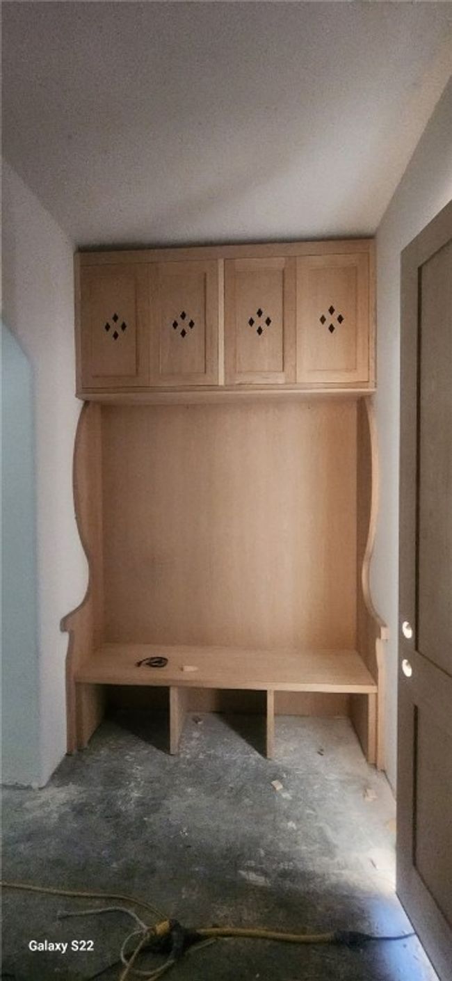 Mudroom with concrete flooring | Image 14