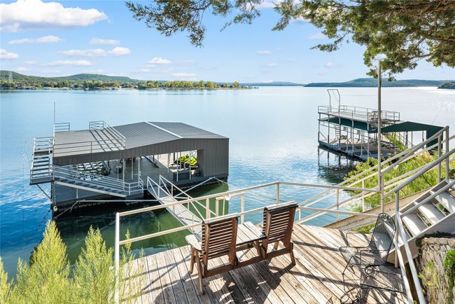 Dock area featuring a water view | Image 8