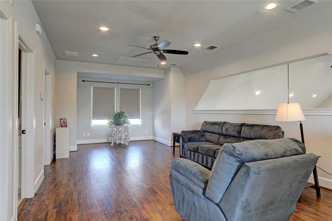 Second floor. An spacious Game room for the family to retreat in privacy and plenty of space for a home office or study desk set up. | Image 19