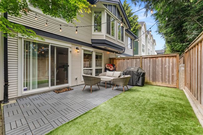 View of patio with a grill and an outdoor living space | Image 35