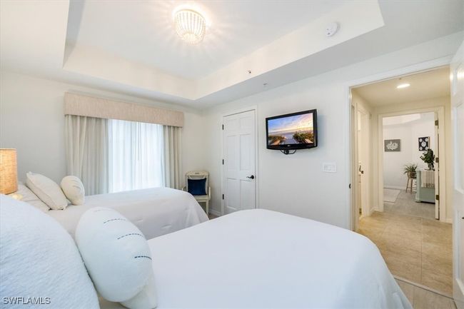Guest bedroom with two oversized twin beds and closet | Image 15