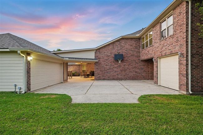 2 separate garages provide plenty of space for both cars and storage | Image 42