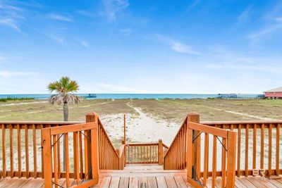 Wooden terrace featuring a water view | Image 3