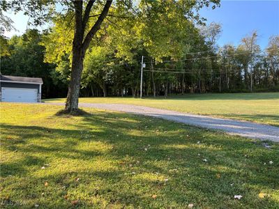 View of yard with a garage | Image 3