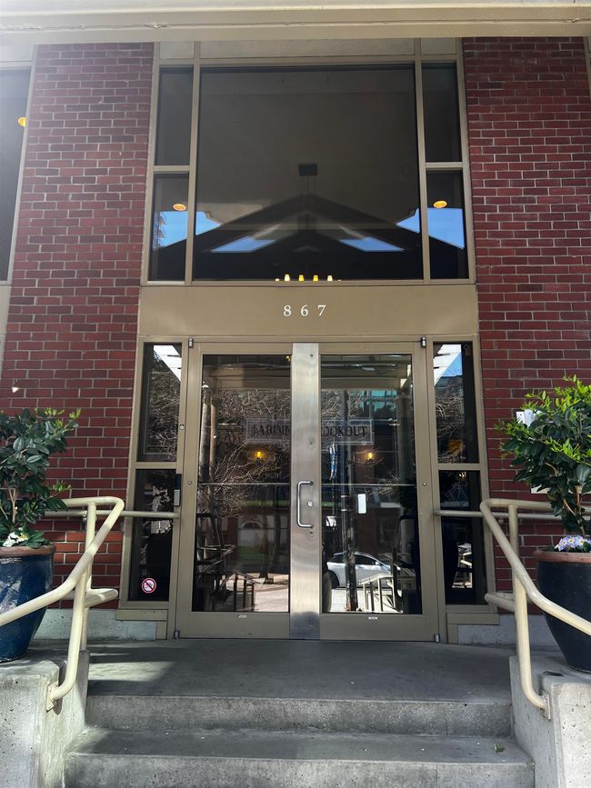 Entrance to property featuring brick siding | Image 15