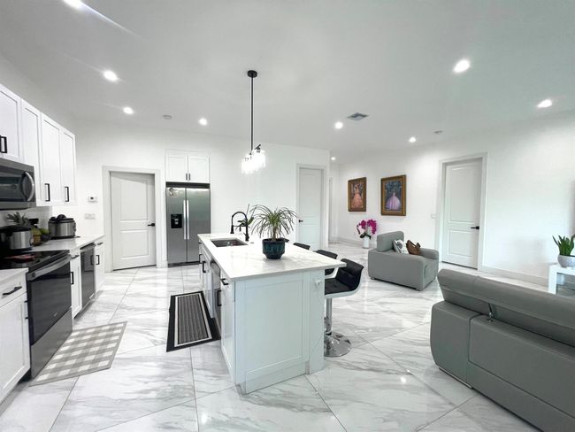 205 Sw Chapman Ave, House other with 4 bedrooms, 2 bathrooms and null parking in Port St. Lucie FL | Image 15