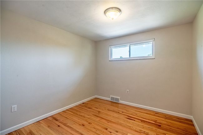 Second bedroom with a spacious closet. | Image 15
