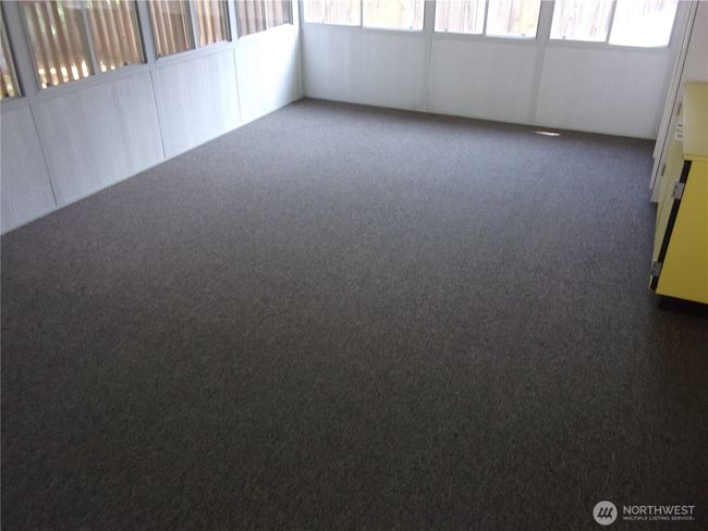 Sunroom has power and is approximately 12 x 15. | Image 24
