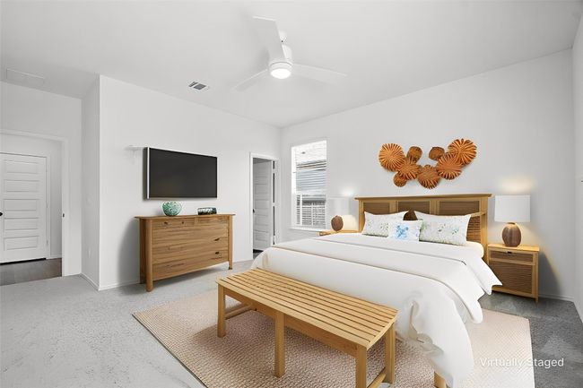 Bedroom featuring ceiling fan and carpet floors | Image 17