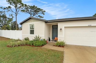 11209 Roman Street, House other with 4 bedrooms, 2 bathrooms and null parking in Spring Hill FL | Image 3