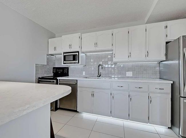 100 - 524 Cedar Crescent Sw, Condo with 2 bedrooms, 1 bathrooms and 1 parking in Calgary AB | Image 23