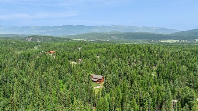 Mountain view featuring a forest | Image 53