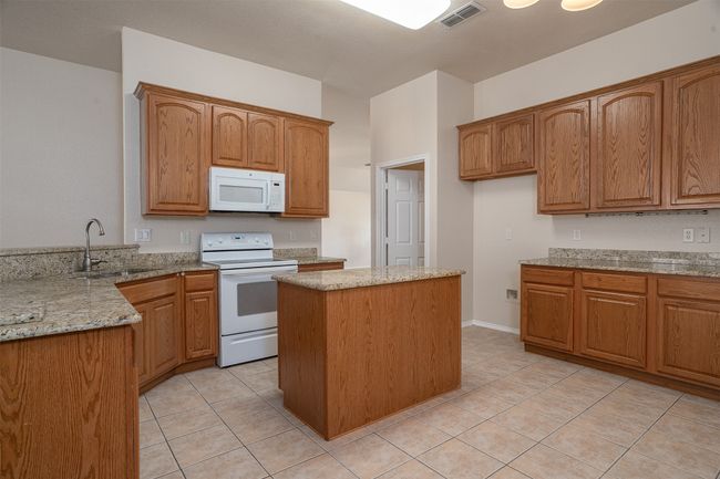 Kitchen with island | Image 14
