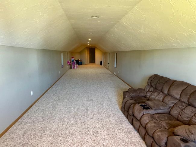 Bonus room above garage | Image 44