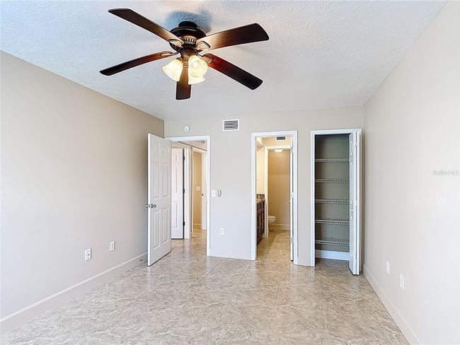 Primary bedroom with extra linen closet closet | Image 22
