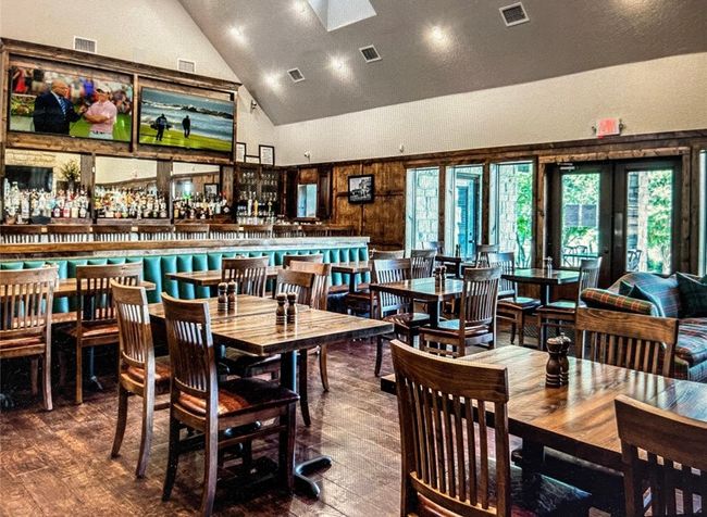 Dining area with high vaulted ceiling, hardwood / wood-style flooring, and french doors | Image 11