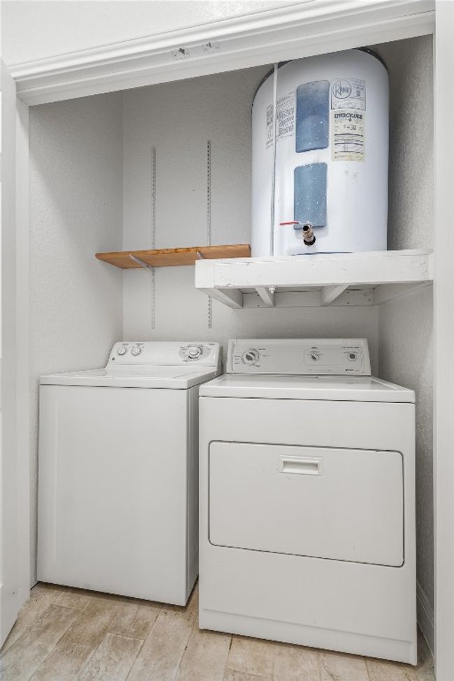 Clothes washing area with separate washer and dryer and laundry area | Image 15