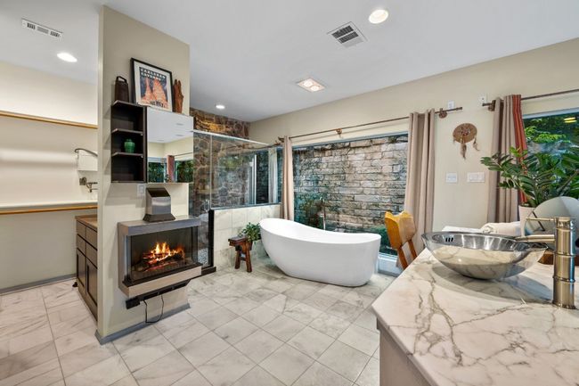 Primary suite has the most wonderful soaking tub! | Image 24