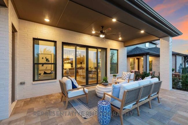 View of patio / terrace with outdoor lounge area and ceiling fan | Image 38