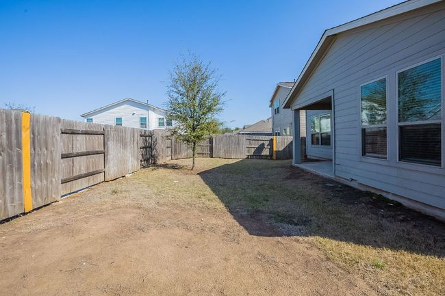 View of yard featuring a fenced backyard | Image 31