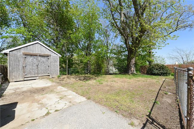 Fenced in Backyard with extra large shed | Image 31
