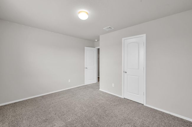 Alternative view of the 4th bedroom. It is located toward the upstairs, right side of the home. | Image 30