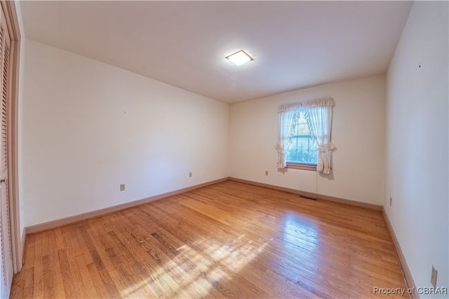 Empty room with light hardwood / wood-style flooring | Image 21