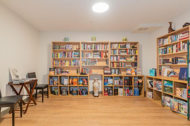Sitting room with wood finished floors | Image 37