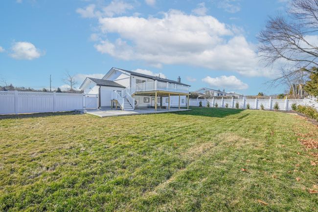 View of yard with a patio and a deck | Image 6