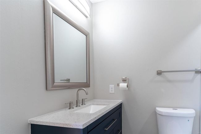 Bathroom with vanity and toilet | Image 24