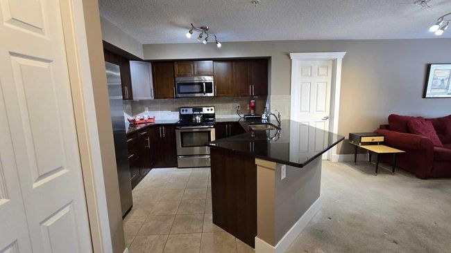 128 - 500 Rocky Vista Gardens Nw, Condo with 2 bedrooms, 2 bathrooms and 1 parking in Calgary AB | Image 4