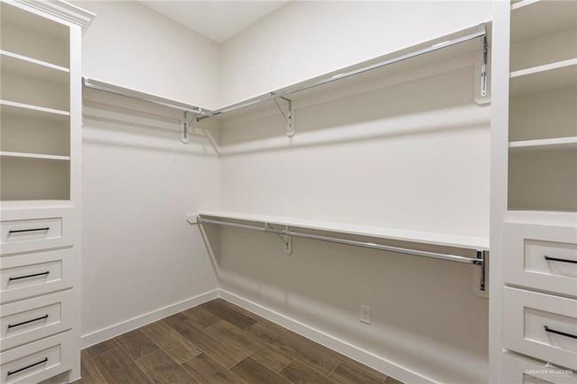 View of spacious closet | Image 15