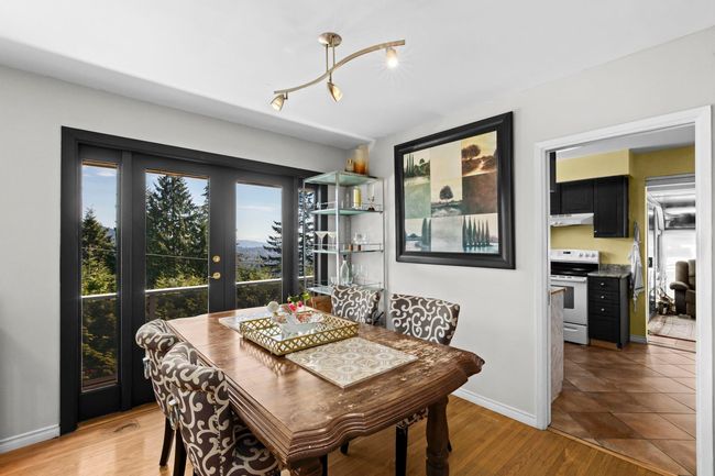 Dining room with baseboards | Image 6