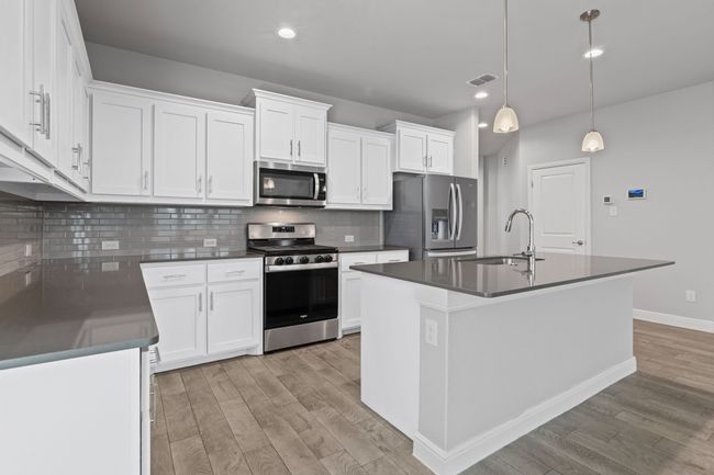 Updated Tile Backsplash, Gas Range, & Lots of Counter Space! | Image 7
