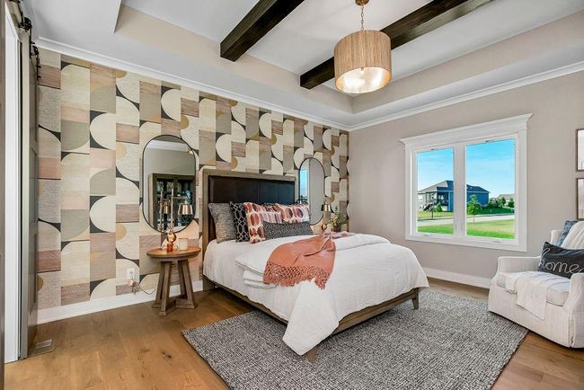 Primary En-Suite with tall ceiling and window to the back yard. Photos of previous model home. Not actual listing. Features and sizes may vary. Contact agent for details & showings! | Image 14