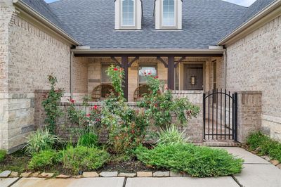 Gated front courtyard with front porch | Image 3