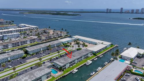106-110 Wettaw Ln, North Palm Beach, FL, 33408-5704 | Card Image