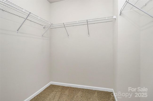 Huge primary walk-in closet. | Image 21