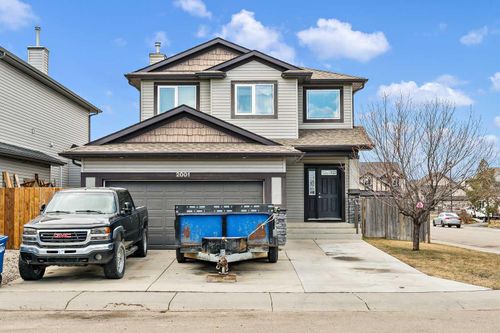 2001 Luxstone Link Sw, Home with 3 bedrooms, 2 bathrooms and 4 parking in Airdrie AB | Card Image