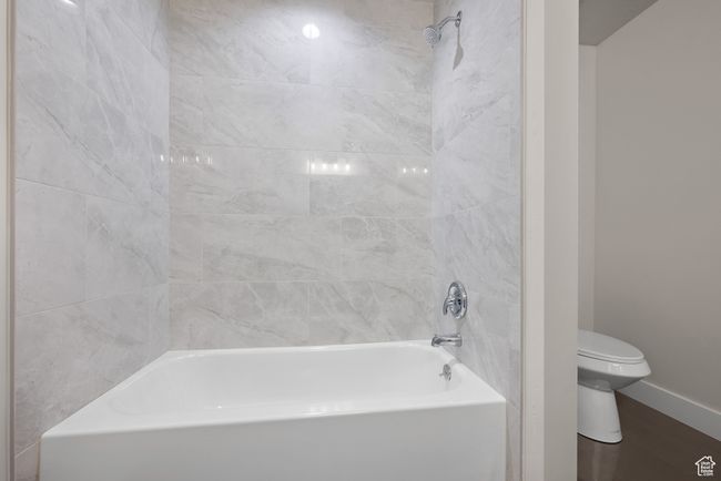 Bathroom with shower combination and wood finished floors | Image 28
