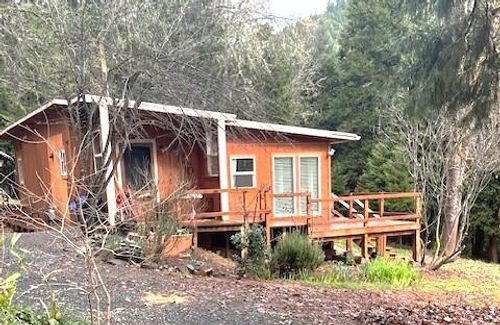 206 Lower Wolf Creek Rd, Wolf Creek, OR, 97497-9512 | Card Image