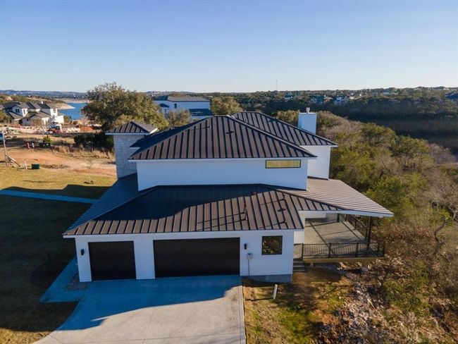 An aerial view showcases the perfect harmony of modern luxury and natural beauty in this exceptional, one-of-a-kind home! | Image 37