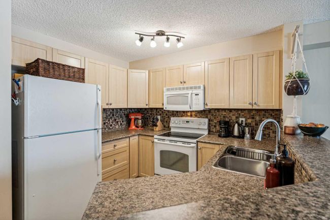 2114 - 16969 24 Street Sw, Home with 2 bedrooms, 1 bathrooms and 1 parking in Calgary AB | Image 15