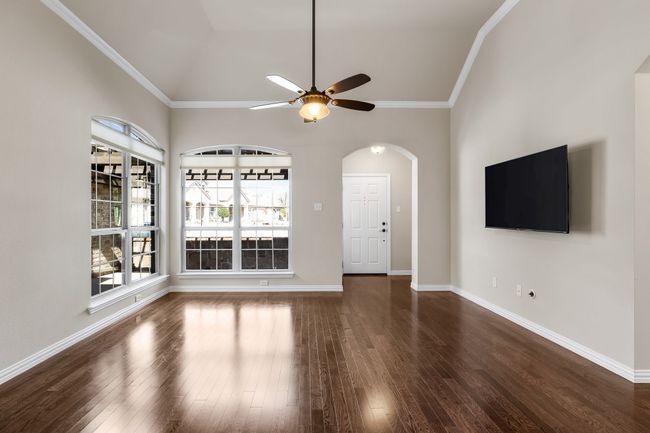 Exquisite wood floors and fresh paint for added warmth and sophistication. | Image 4